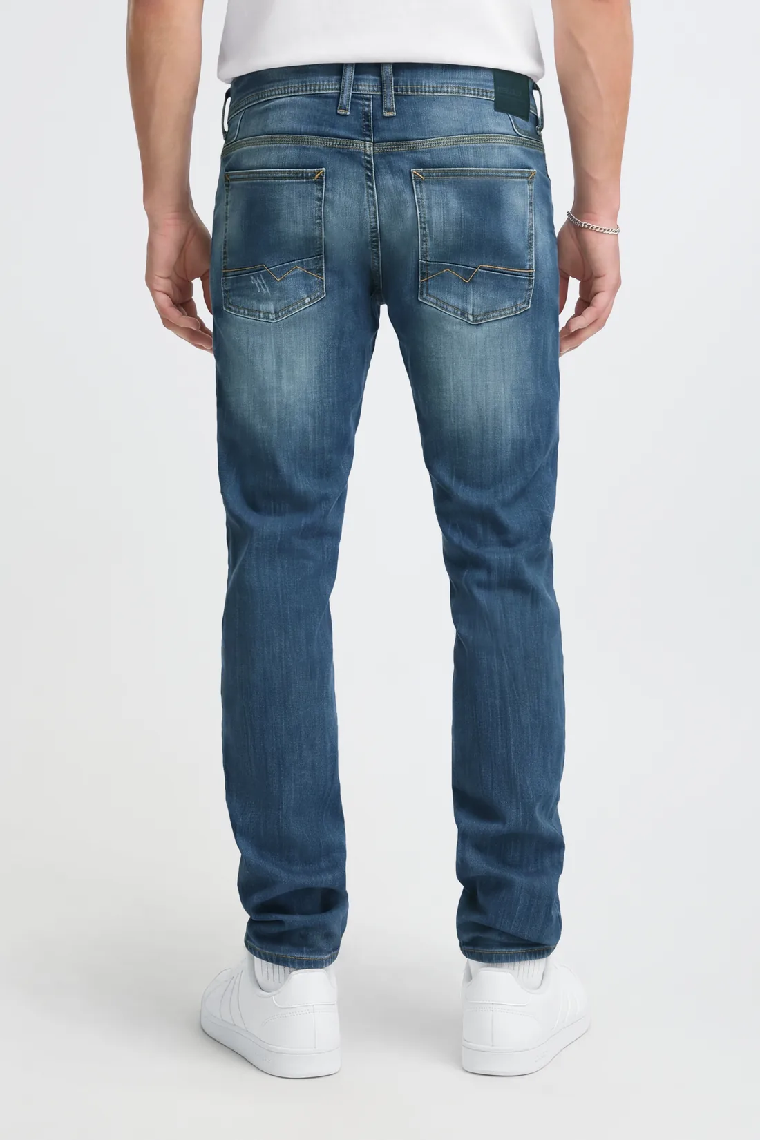 Corrected rear view with accurate denim wash and clean background