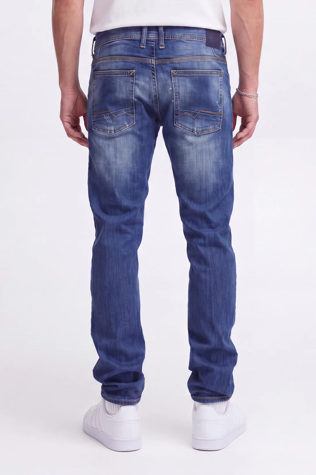 Generated rear view of denim jeans with a heavy blue cast
