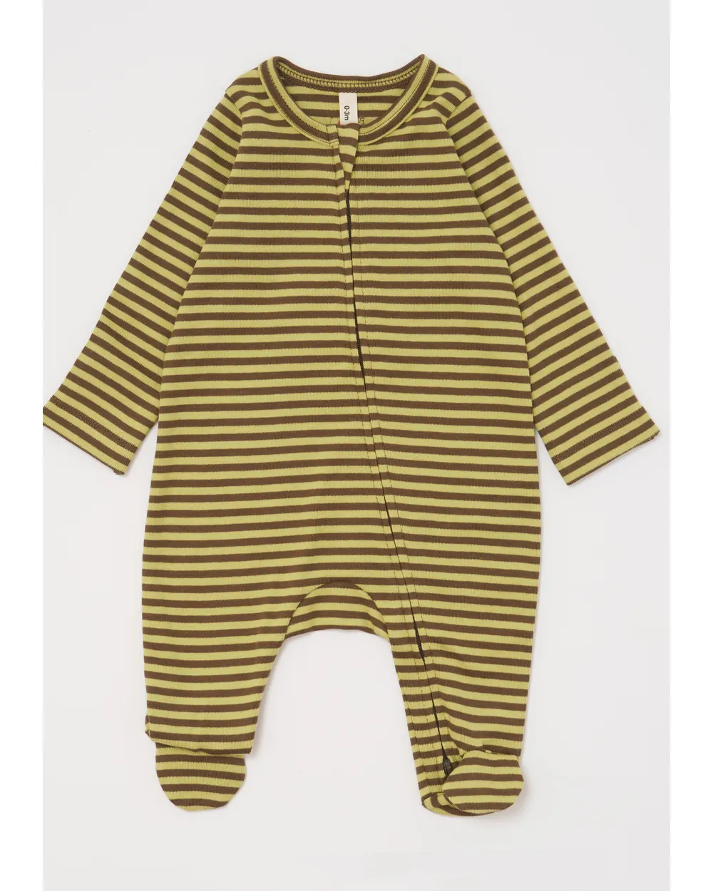 Striped baby sleepsuit as shot on a warm grey backdrop