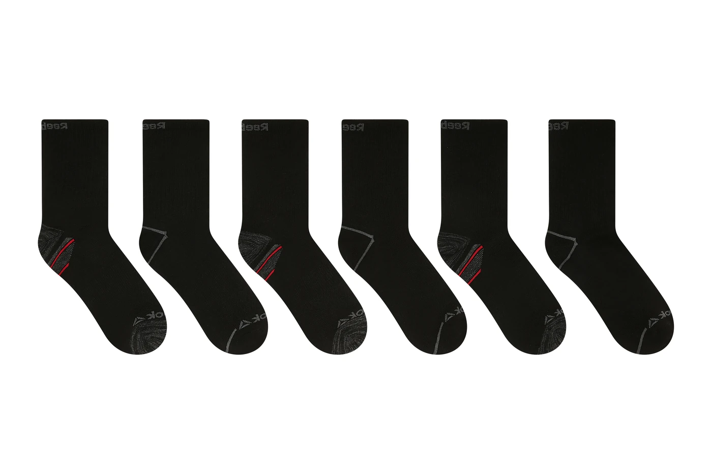 The same socks after retouching — six pairs aligned and cut out on pure white