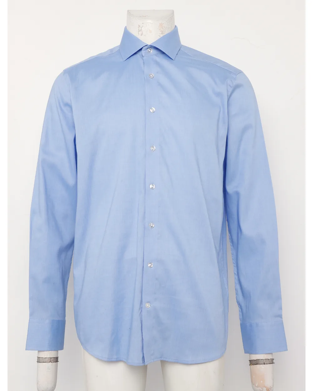 Blue formal shirt as shot on a mannequin with the arms visible